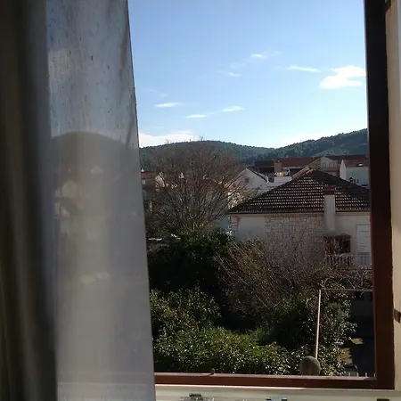 Mili *